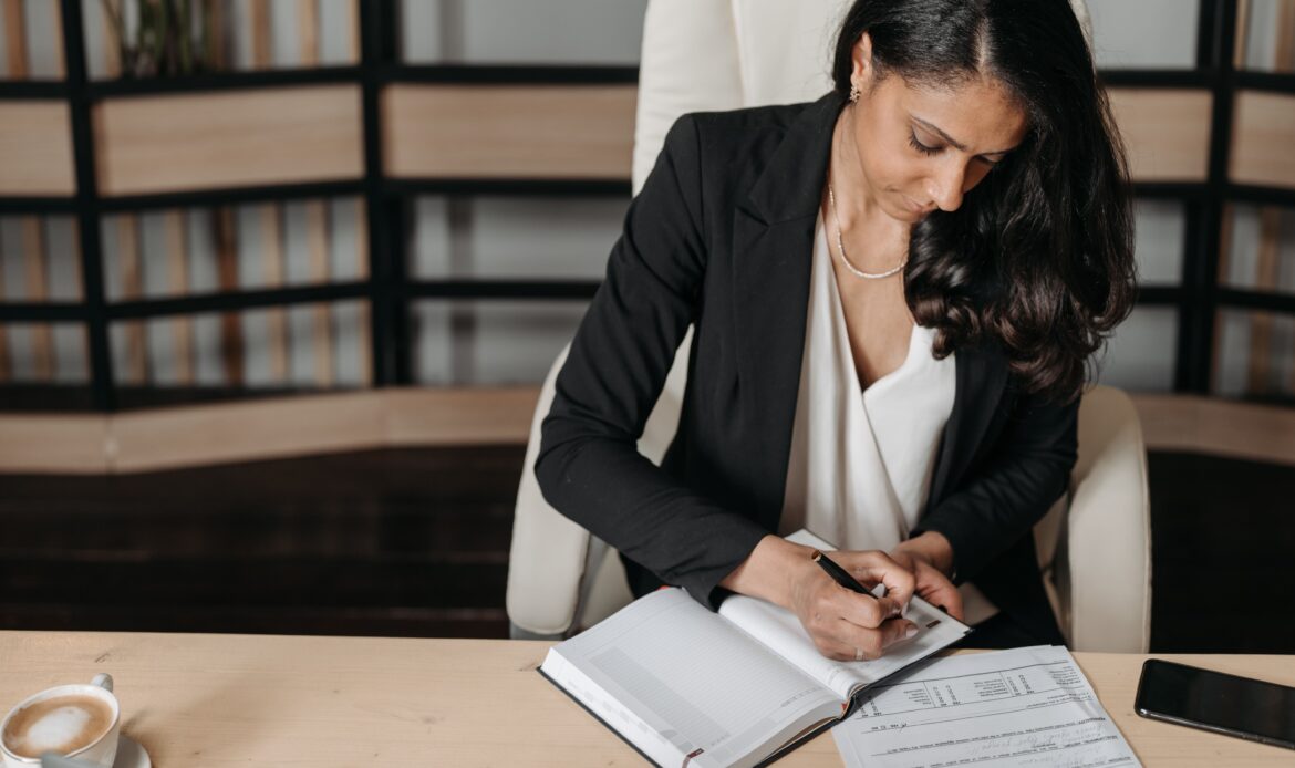 A lady making personal growth checklist